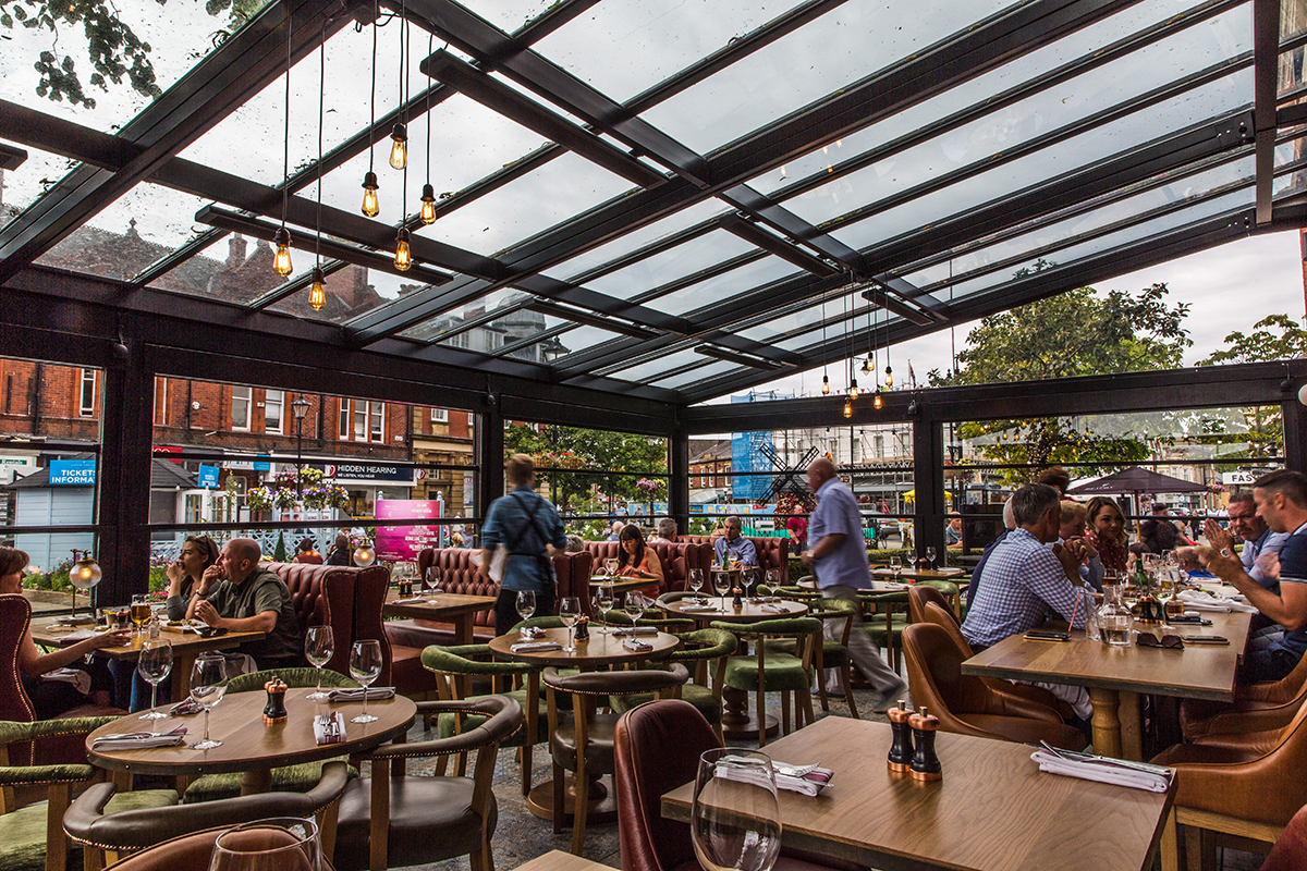 Adjustable glass barriers